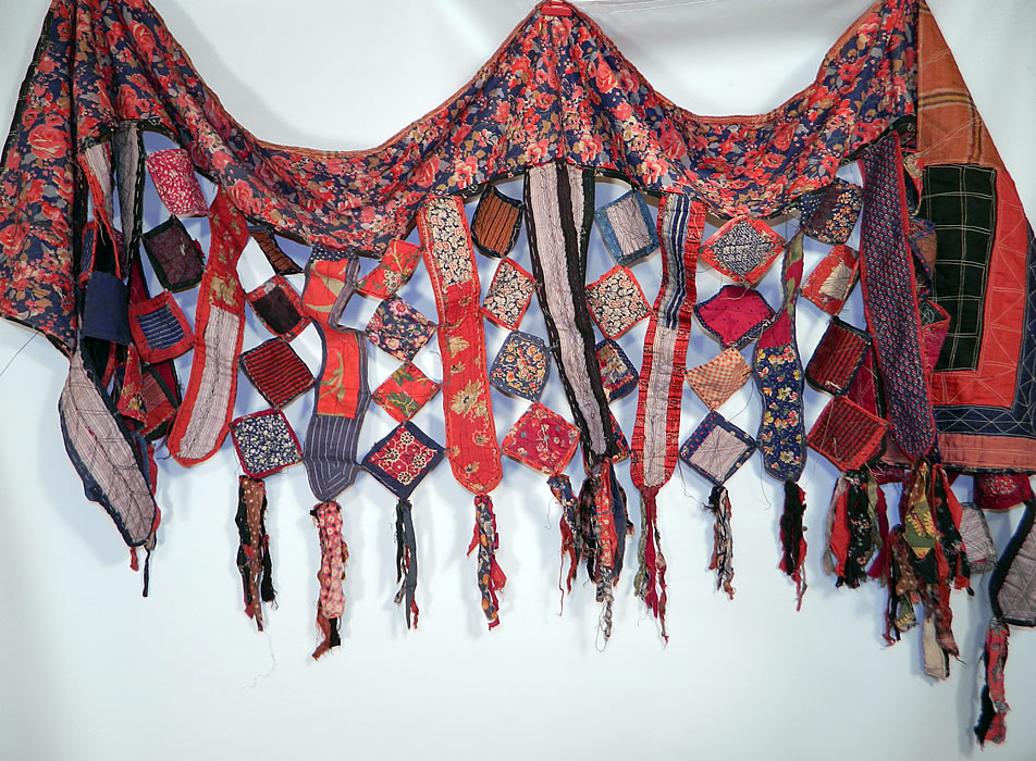 Antique Uzbekistan Tajik Ikat Patchwork Quilt Fabric Textile Door Curtain Wall Hanging
This antique Uzbekistan Tajik ikat patchwork quilt fabric textile door curtain wall hanging dates from the 1930s. It is made of a variety of colorful floral, calico print cotton fabrics and dyed ikat patterns created in a scrappy pieced patchwork design.