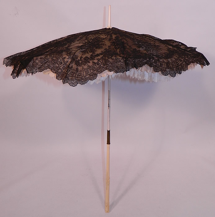 Victorian Civil War Antique Black Chantilly Lace Carved Roses Folding Handle Parasol
This is truly a rare and wonderful antique Victoriana parasol! 