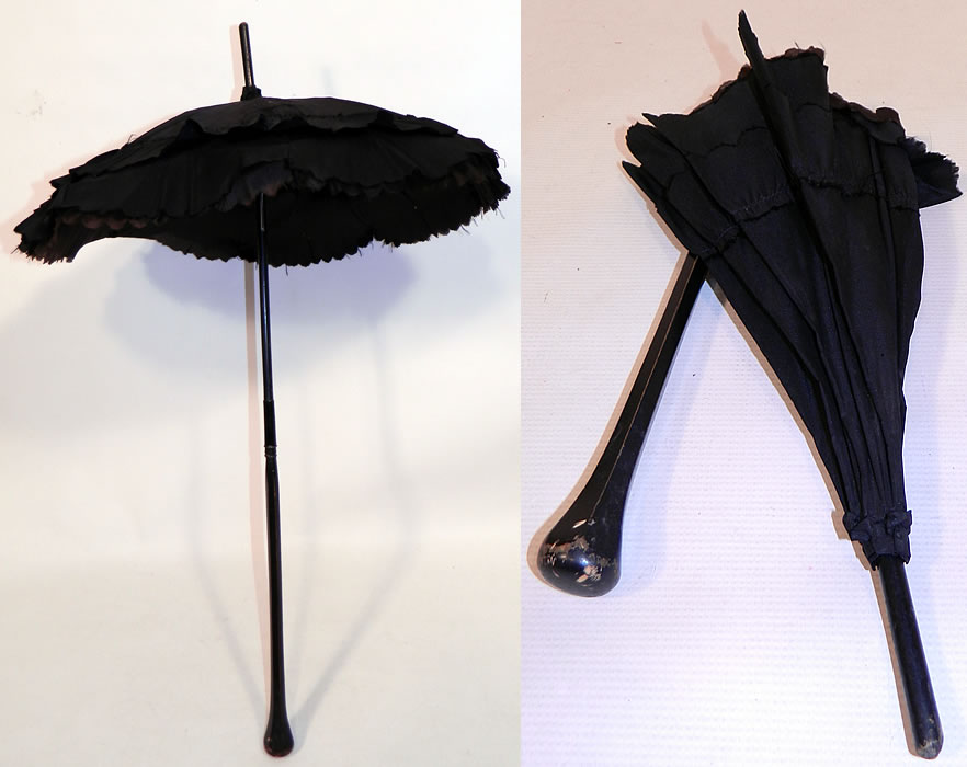 Victorian Civil War Black Silk Folding Handle Marquis Mourning Parasol
It is made of a black silk fabric, with a layered tiered scalloped ruffle trim edging. 