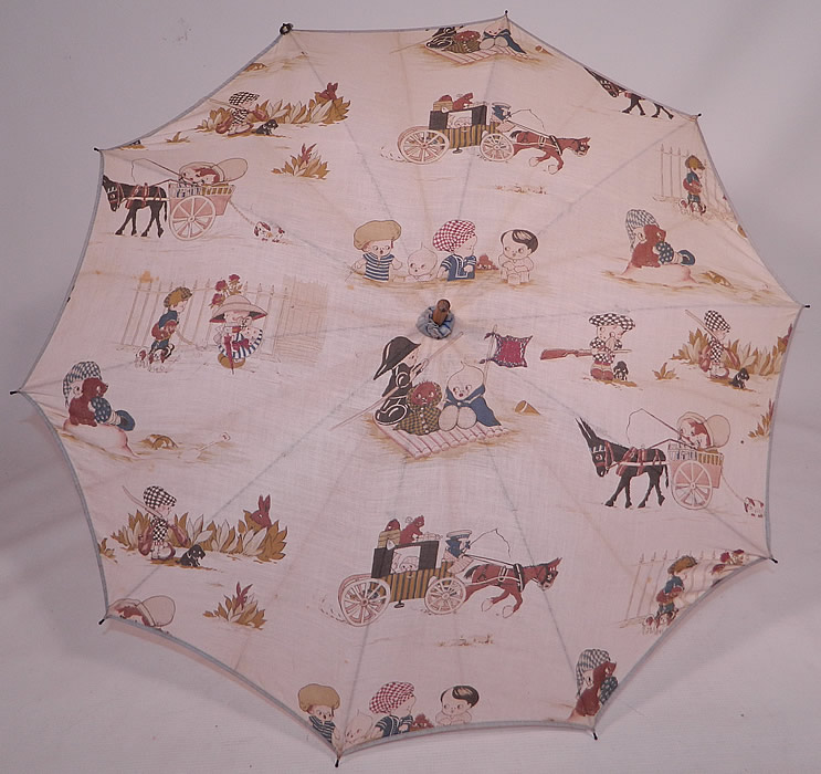 Vintage Chloe Preston Childrens Kewpie Illustration Print Linen Parasol
This vintage Chloe Preston children's Kewpie illustration print linen parasol dates from the 1920s.