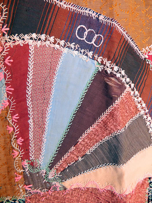 Victorian Antique Worsted Wool Embroidered Needlework Crazy Quilt
There is a soft flannel fabric floral print backing, with red yarn trim ties knots on back. This charming quilt has been beautifully hand made with wonderful workmanship. This charming quilt has been beautifully hand made with wonderful workmanship. The quilt measures 85 by 75 inches. 