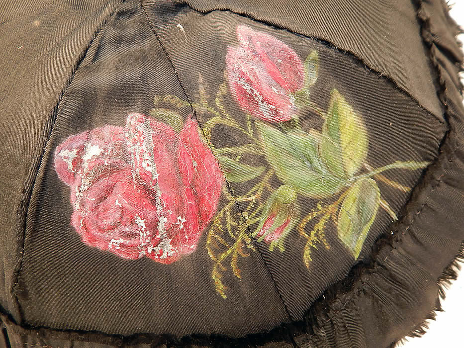 Victorian Black Silk Hand Painted Roses Grape Leaf Wood Carved Handle Parasol
The parasol measures 21 inches long and is 50 inches in circumference when opened up. It is in good condition, with only some slight wear to the paint on the rose decoration and a few small splits on the white silk fabric lining inside (see close-ups).