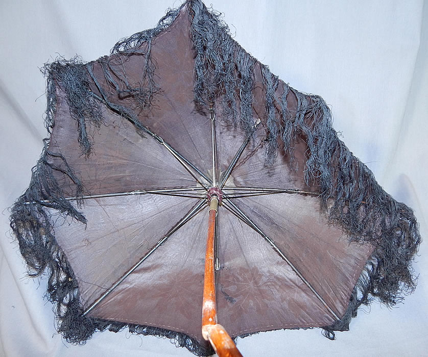 Victorian Antique Black Silk Damask Maple Leaf Carved Wood Folding Handle Parasol
This is truly a wonderful early antique Victoriana parasol needing some restoration repair!