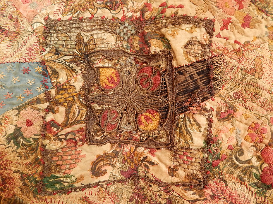 Antique 18th Century Textile Embroidered Patchwork Gold Bullion Round Tablecloth
It is made of a patchwork of pieced colorful silk, velvet and cotton brocade fabrics, with gold metallic lace appliqué trimmings.