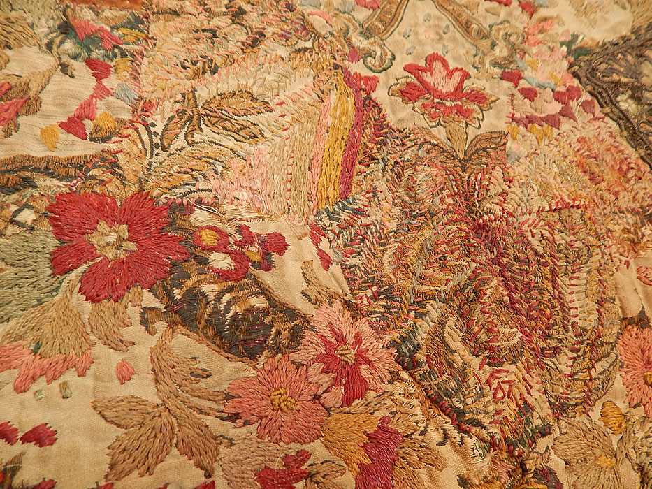 Antique 18th Century Textile Embroidered Patchwork Gold Bullion Round Tablecloth
The floral brocades have been hand embroidered over highlighting the flowers, with decorative stitching and quilting. 