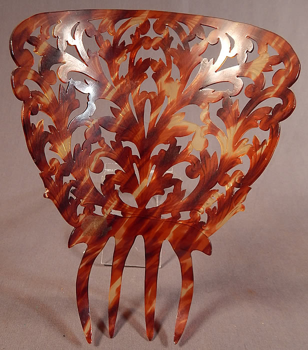 Vintage Large Celluloid Faux Tortoiseshell Spanish Flamenco Mantilla Peineta Hair Comb
The comb measures 9 inches long and 8 inches wide at the top. It is in excellent condition. This is truly a rare and wonderful piece of Spanish wearable art! 